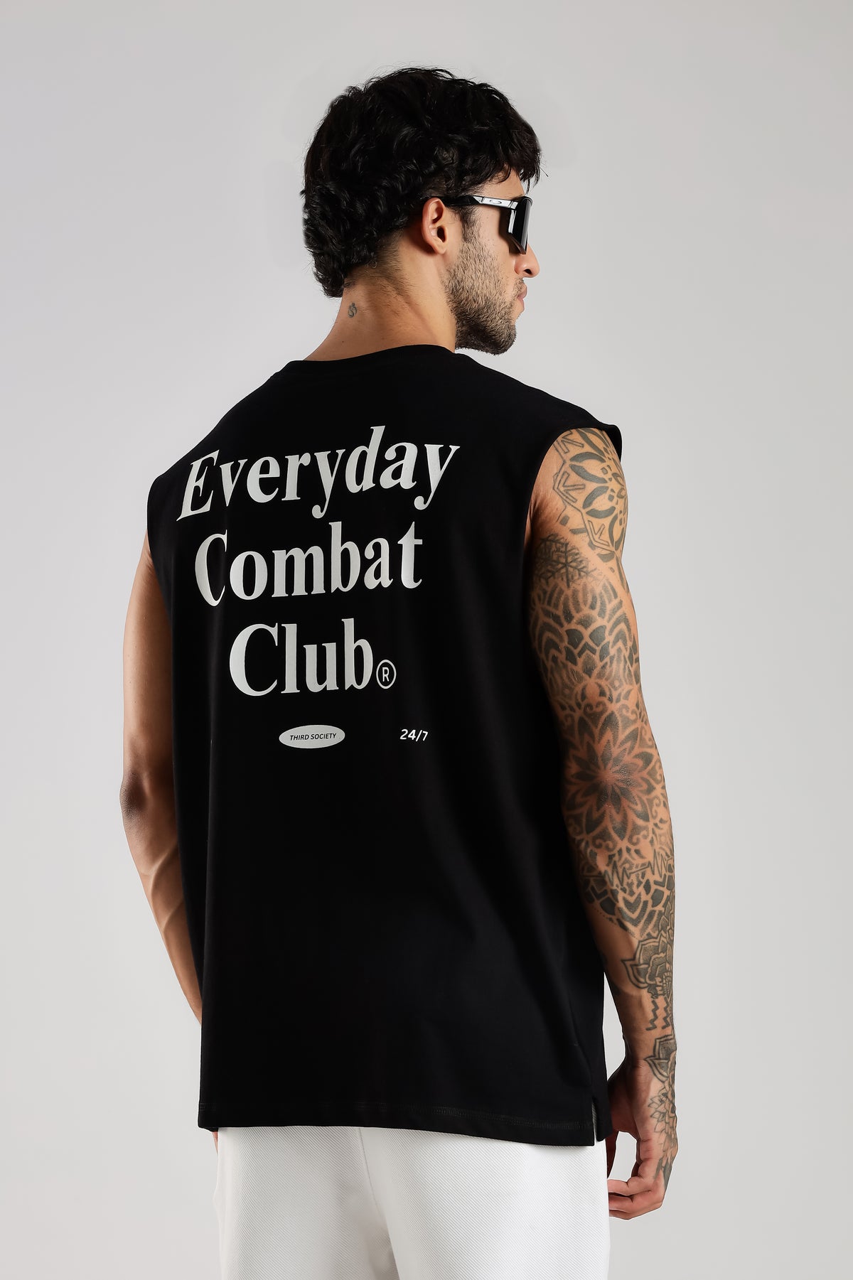 Close back view of the black Combat Club tank top showing the Everyday Combat Club graphic