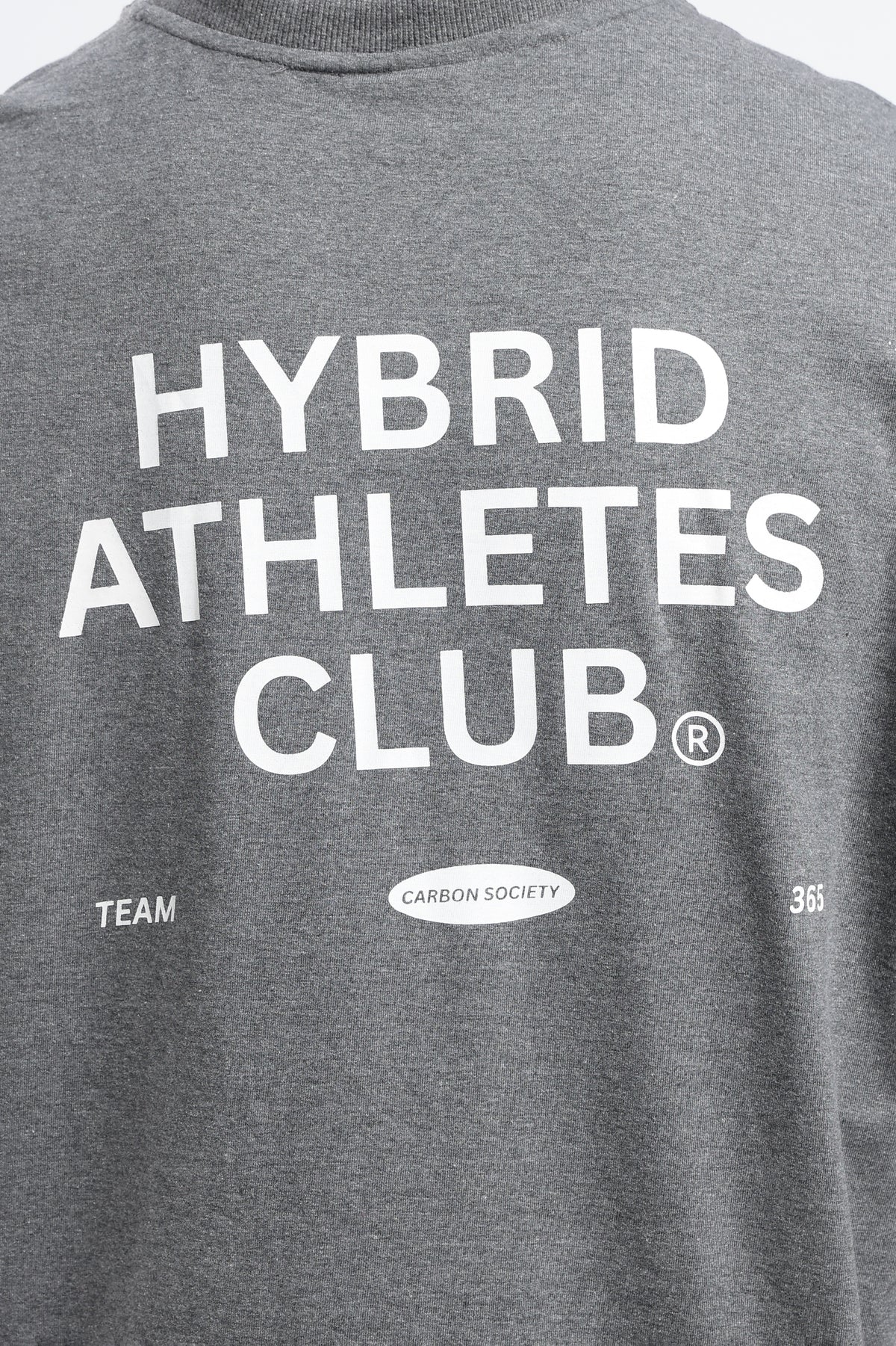 Close-up of the Grey Marl tank top showing the Hybrid Athletes Club back graphic