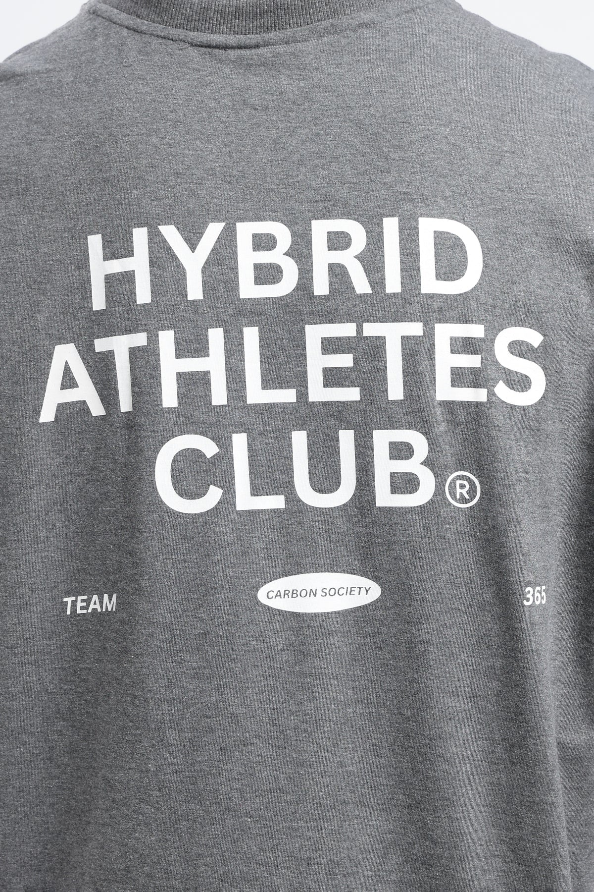 Close-up of the Grey Marl tank top showing the Hybrid Athletes Club back graphic