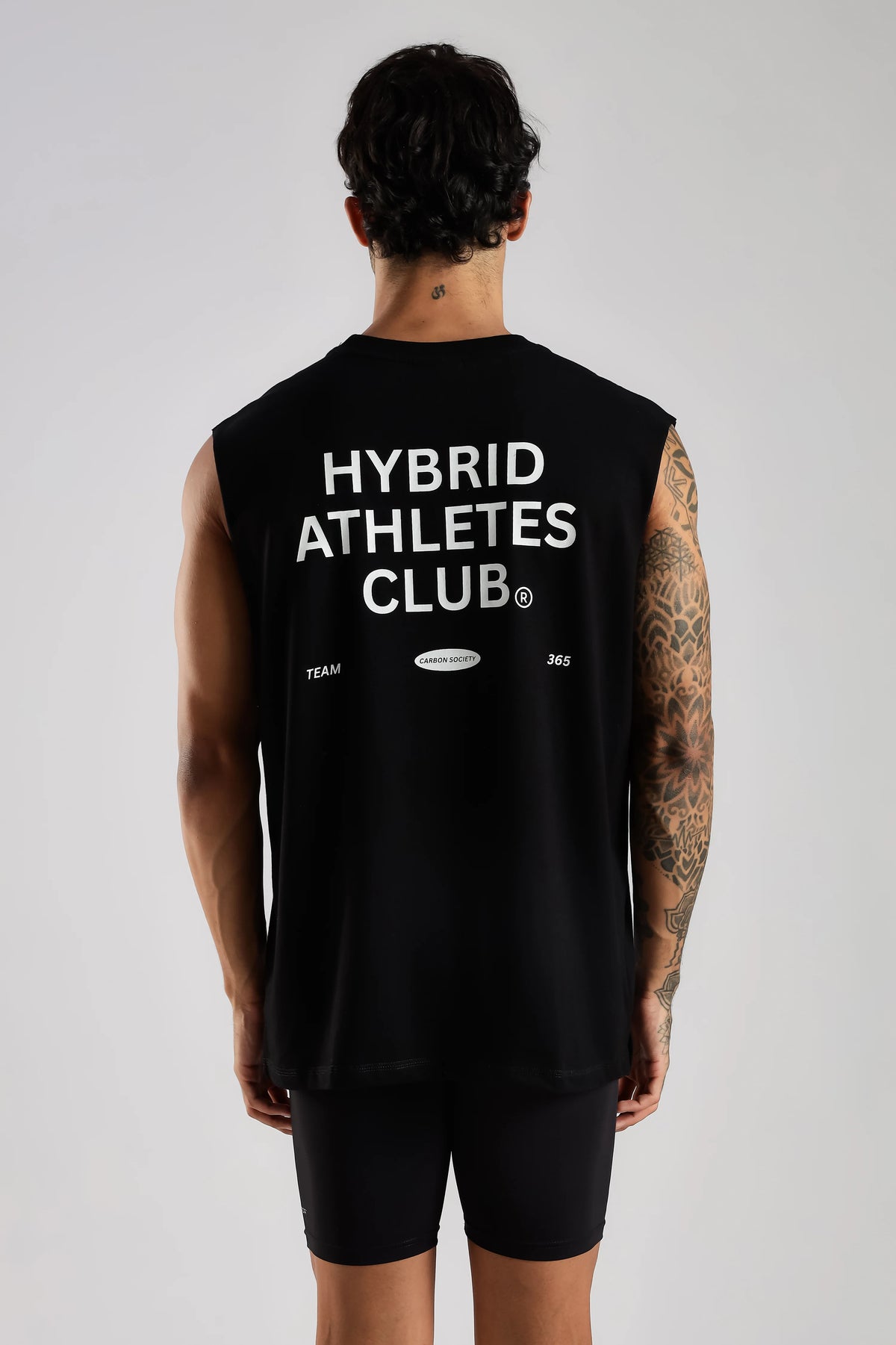 Black sleeveless tank top with Hybrid Athletes Club back graphic