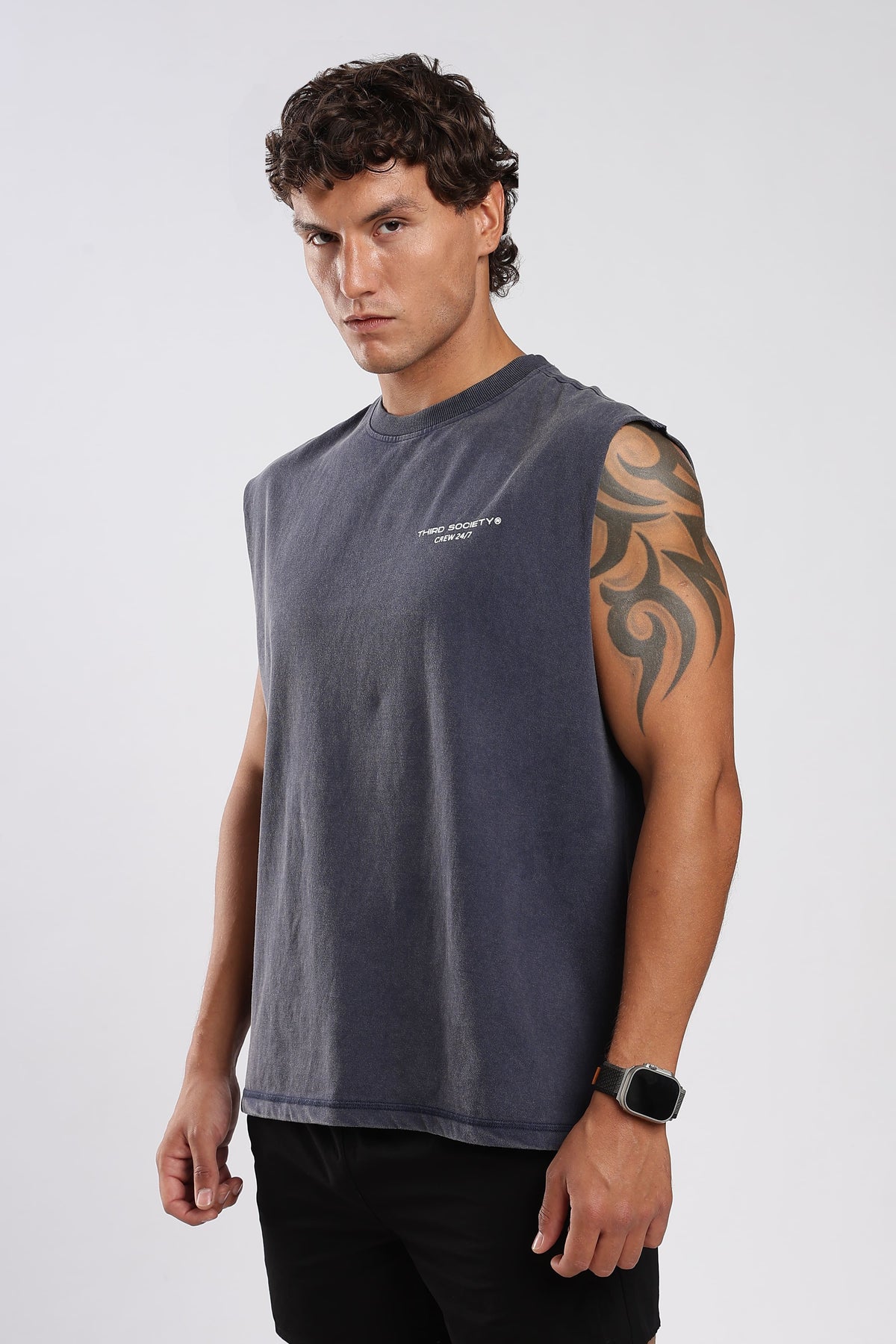 Side view of the Iron Slate tank top showing the oversized fit