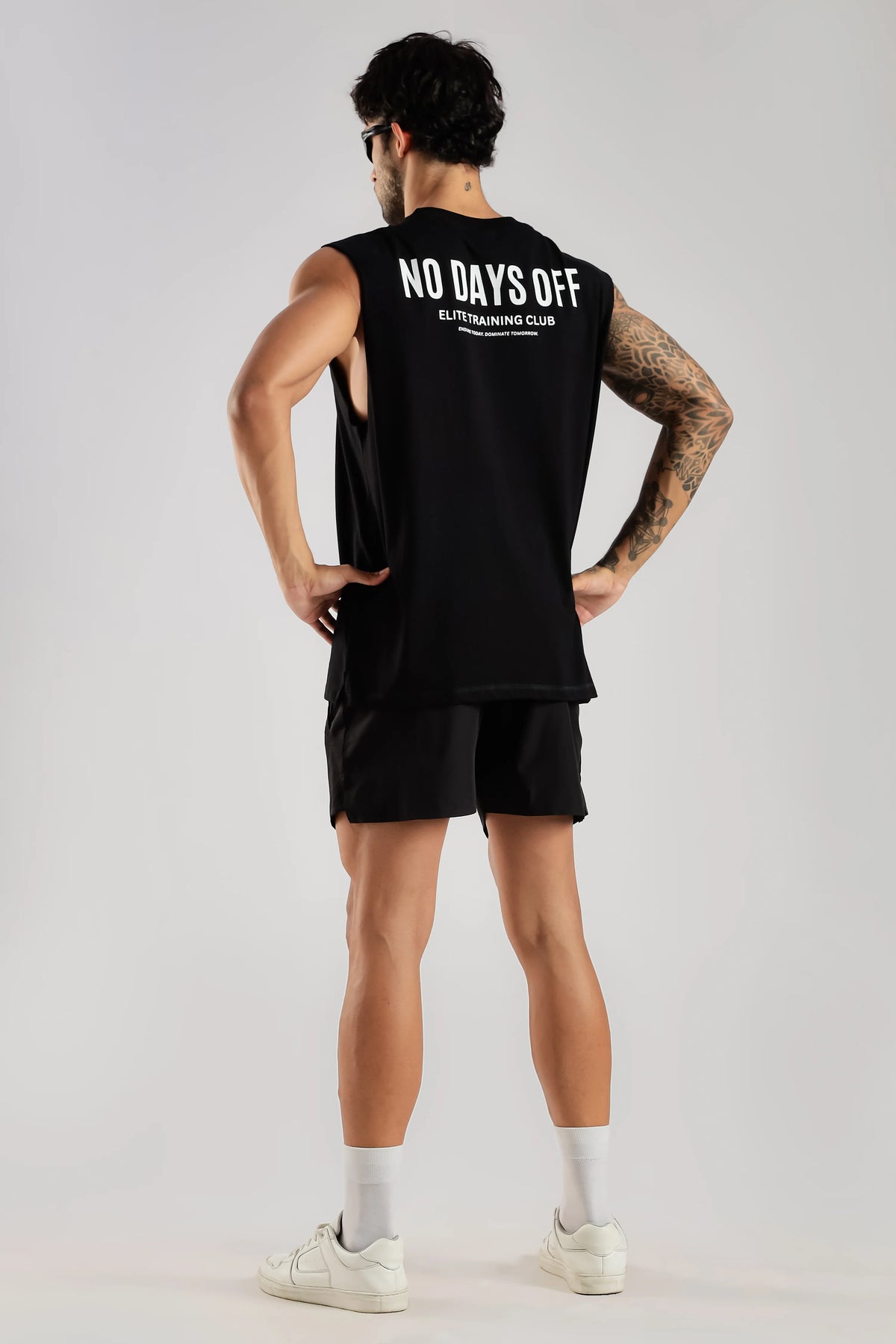 Black tank top with No Days Off Elite Training Club back print
