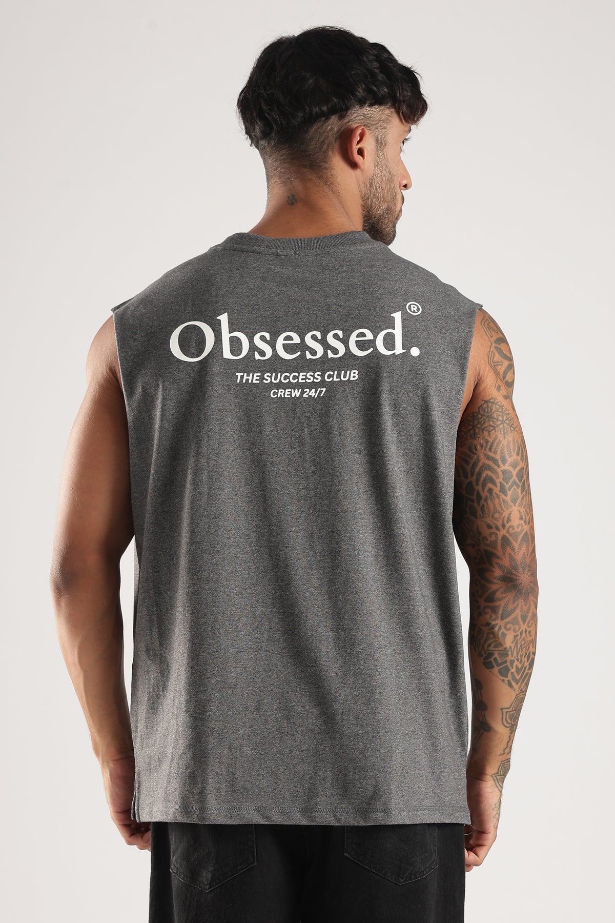 Back view of the Grey Marl Obsessed Tank with the large Obsessed The Success Club graphic