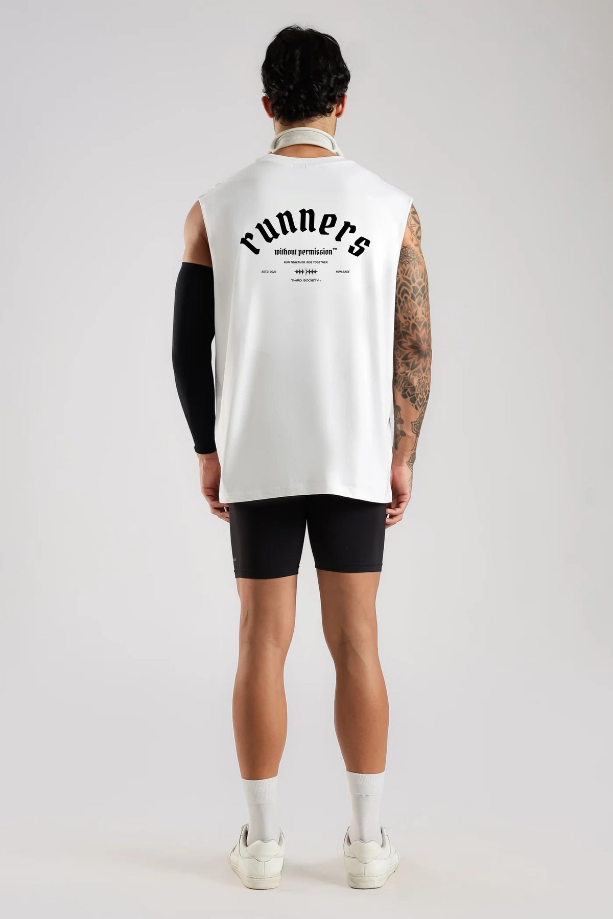 Back view of the white Runners Without Permission tank top