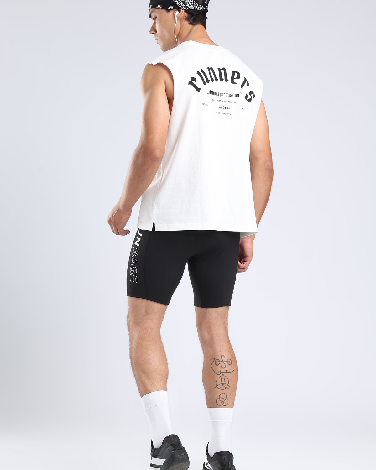 Back view of the white Runners Without Permission tank with its black graphic