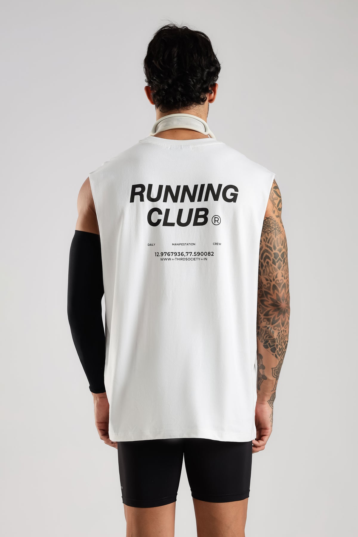White Running Club tank top showing the large back graphic
