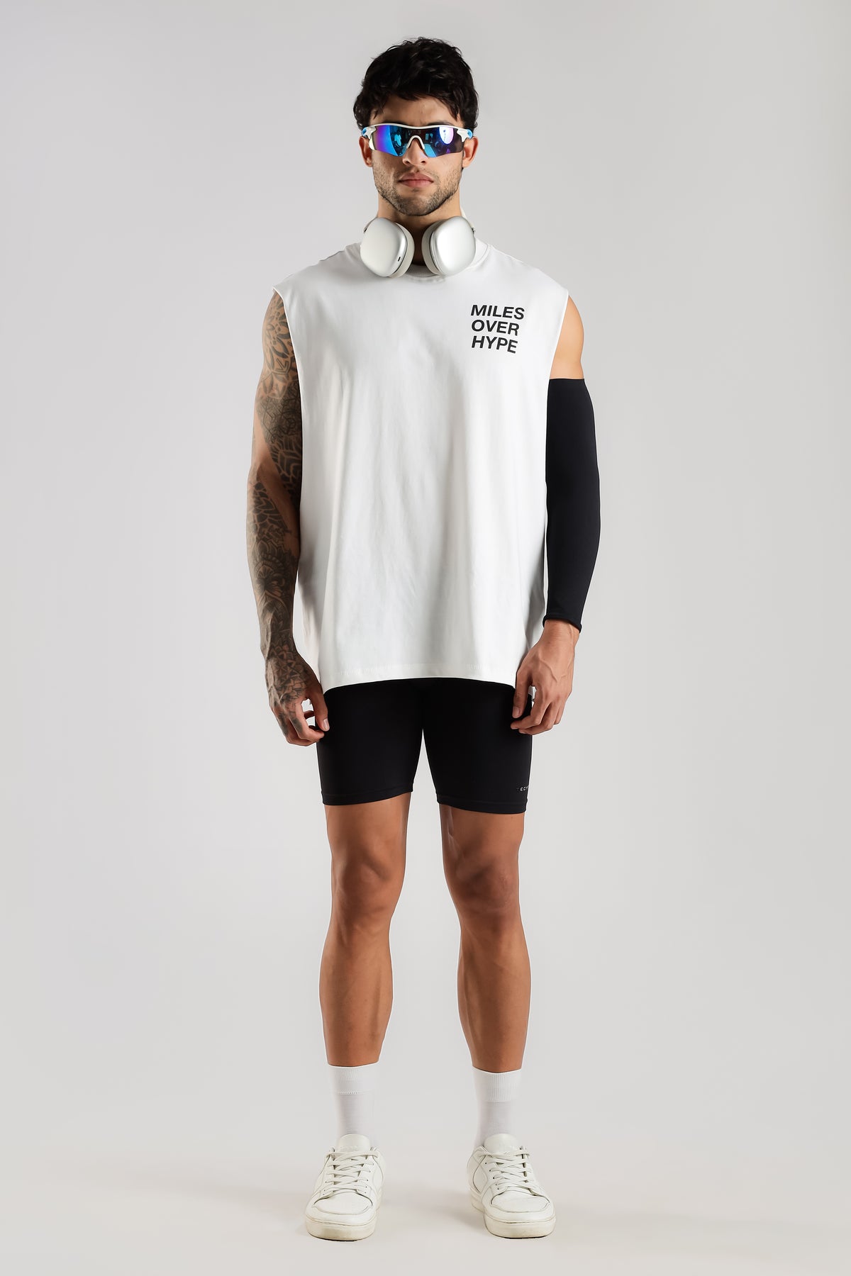 Full front view of the white Running Club tank top
