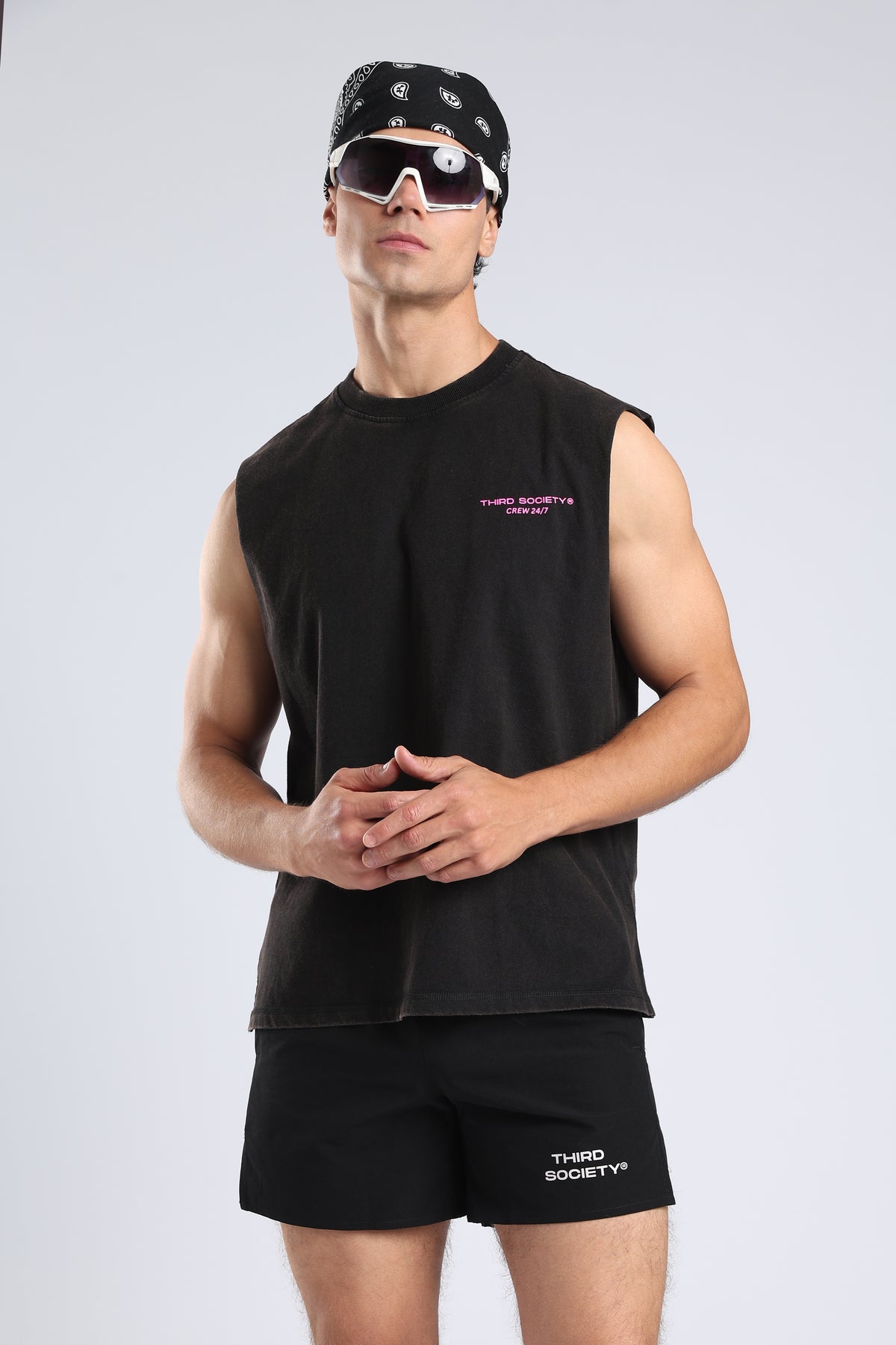 Full view of the Carbon Wash tank styled with black shorts and trainers