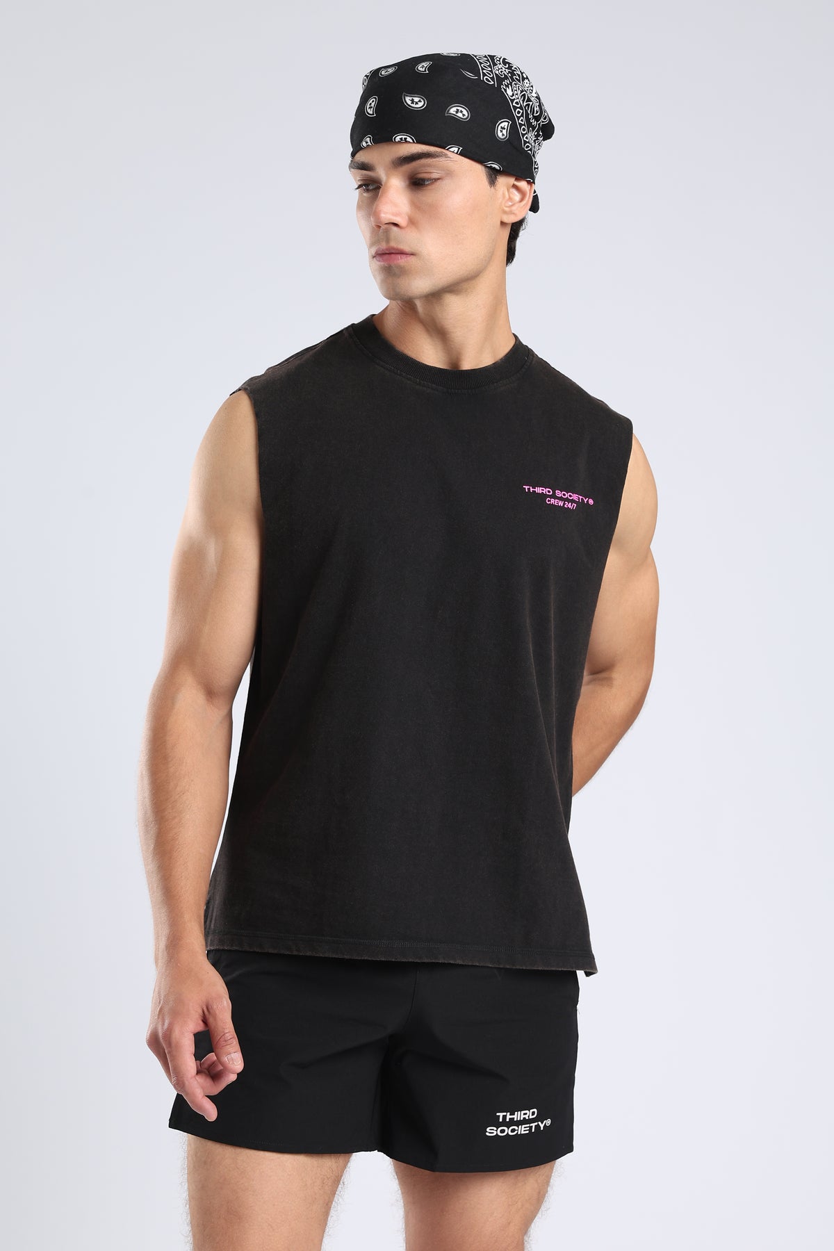 Model wearing the Carbon Wash tank with a black bandana