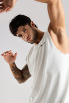 Close-up of the white Combat Club Tank showing its sleeveless cut and relaxed fit