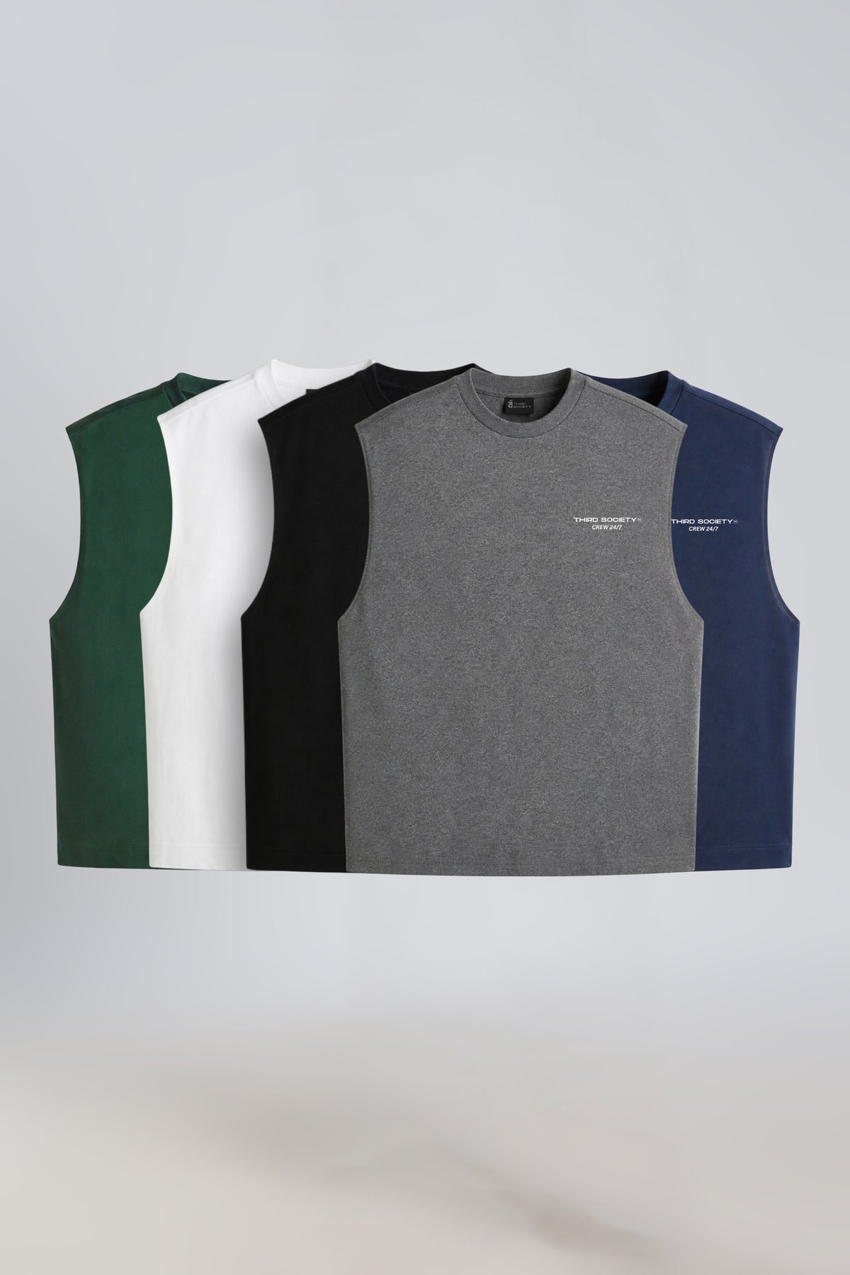 Five men's tank tops in Green, White, Black, Grey Marl and Navy displayed together