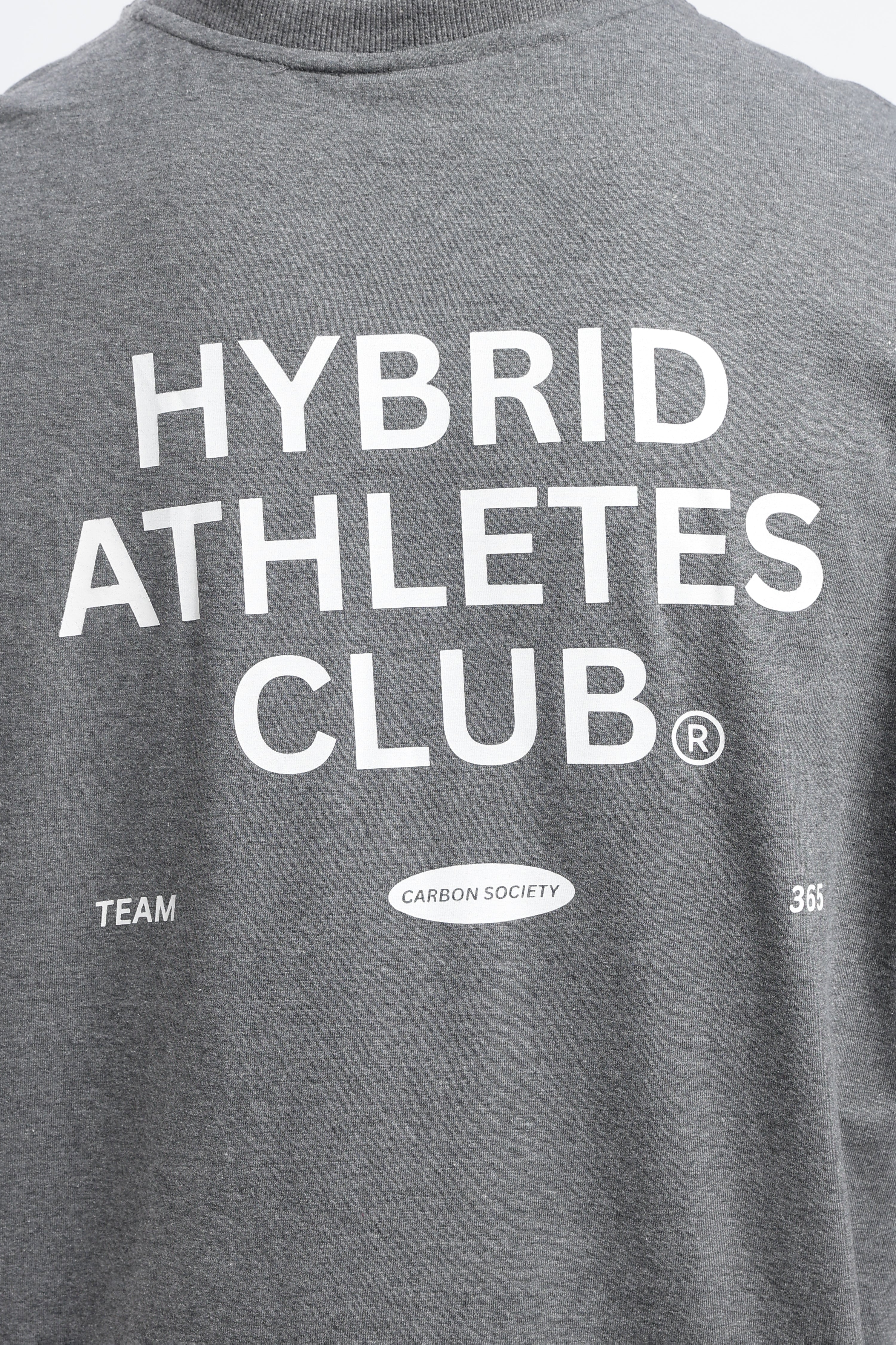 Close-up of the Grey Marl tank top showing the Hybrid Athletes Club back graphic