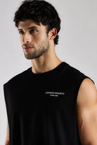 Close-up of black tank top showing Carbon Society chest graphic