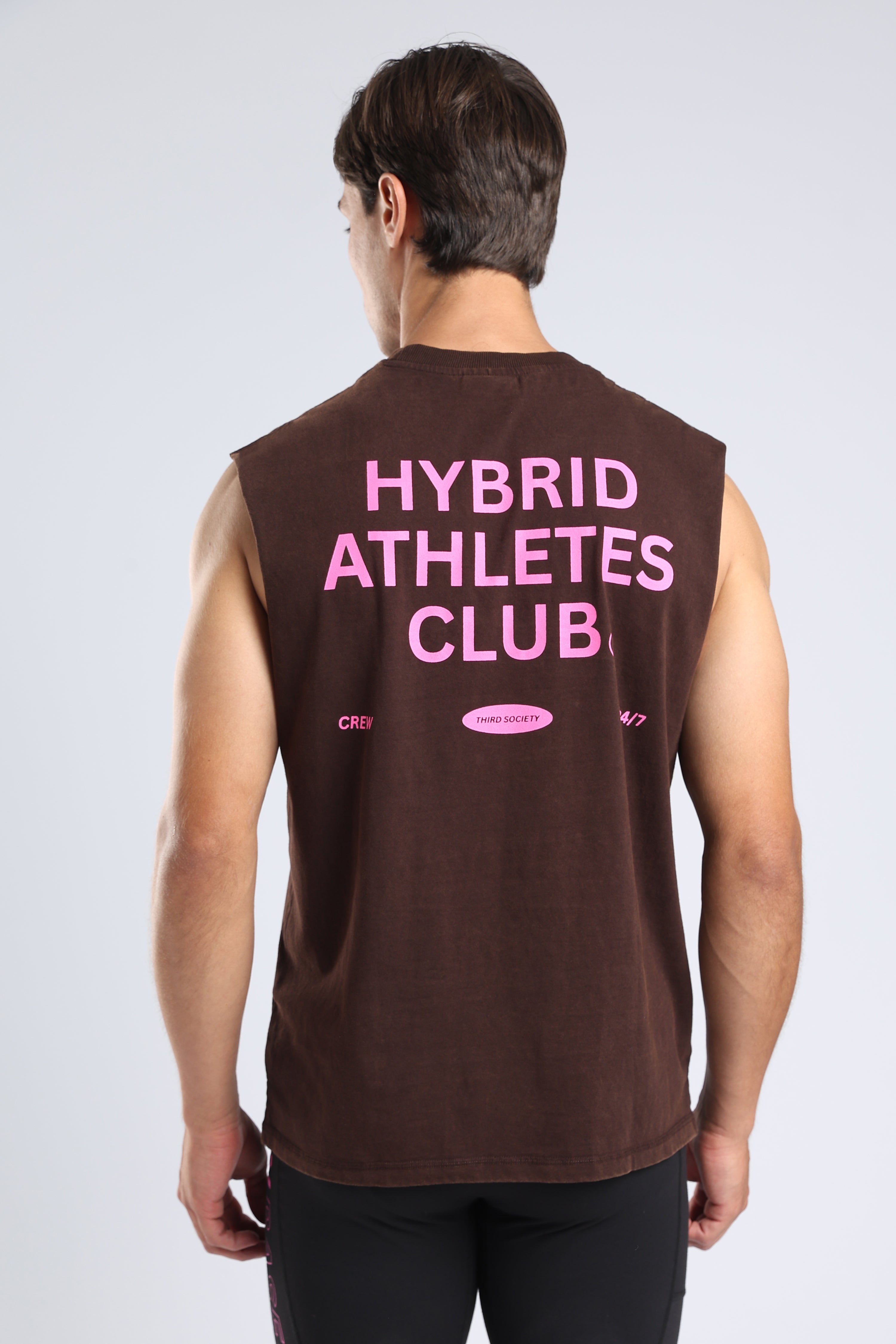 Close-up of the pink Hybrid Athletes Club graphic on the brown tank