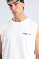 Close-up of the black Third Society Crew 24/7 chest branding on the white tank