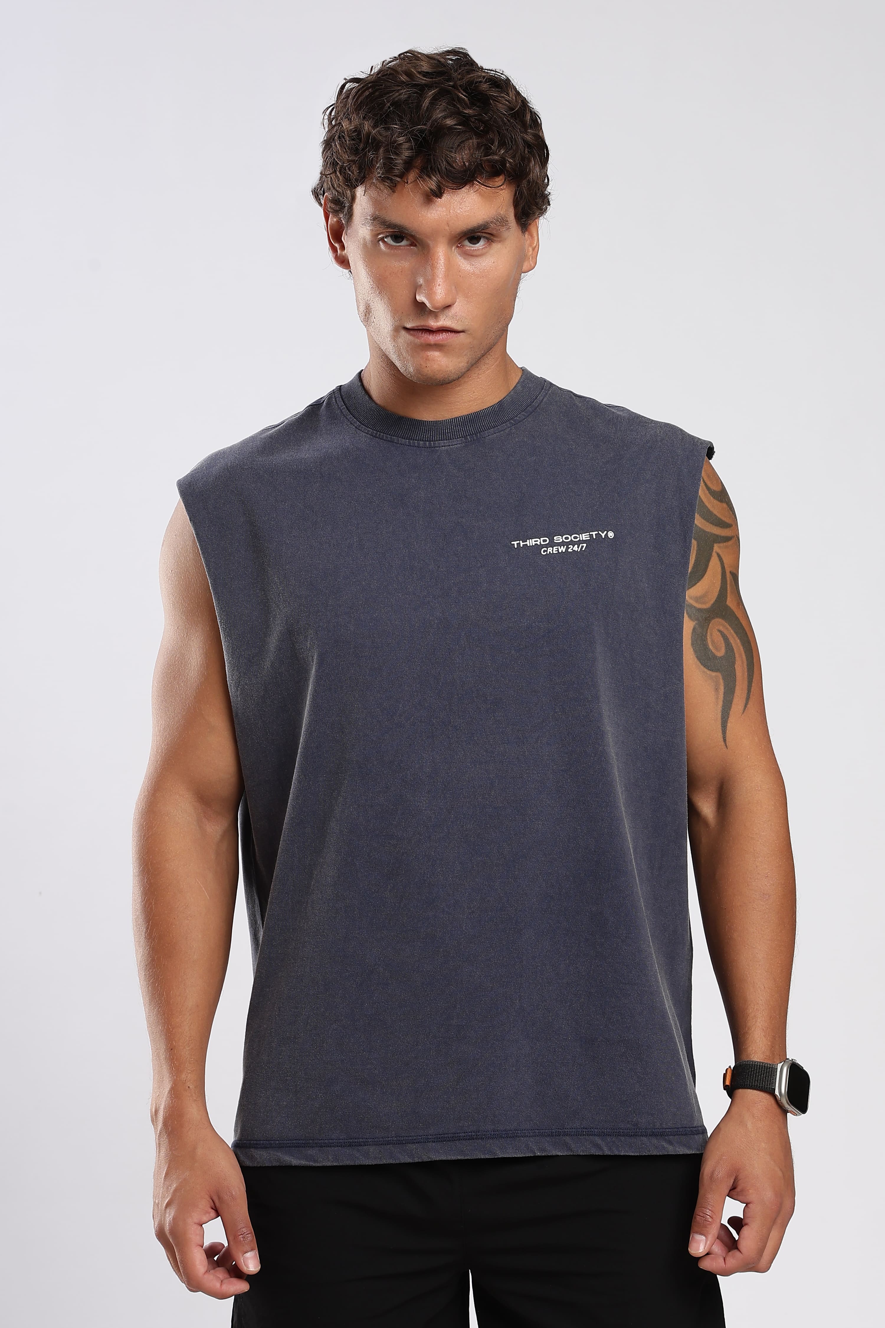 Close-up of Iron Slate tank top showing the crew neckline and chest logo