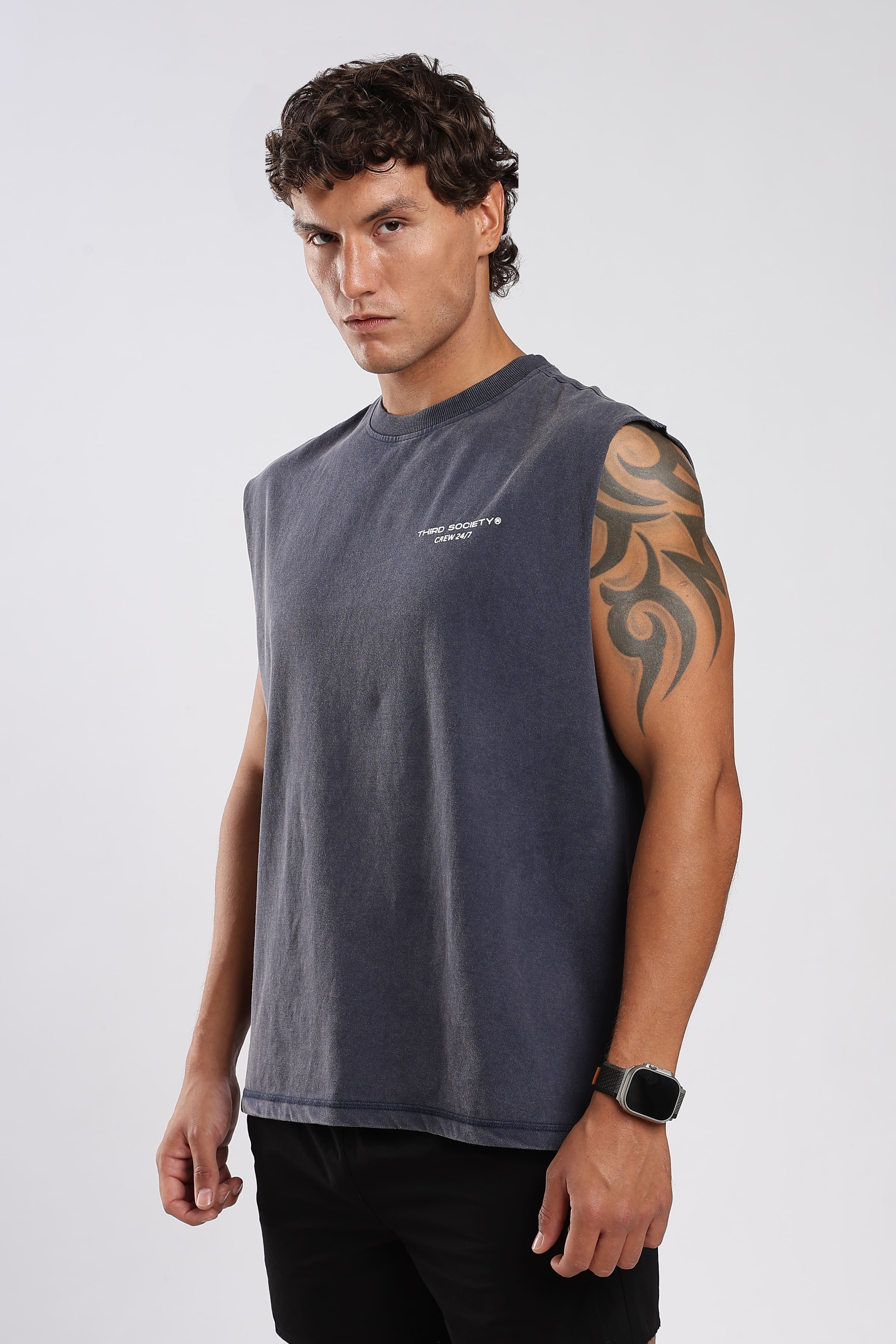 Side view of the Iron Slate tank top showing the oversized fit