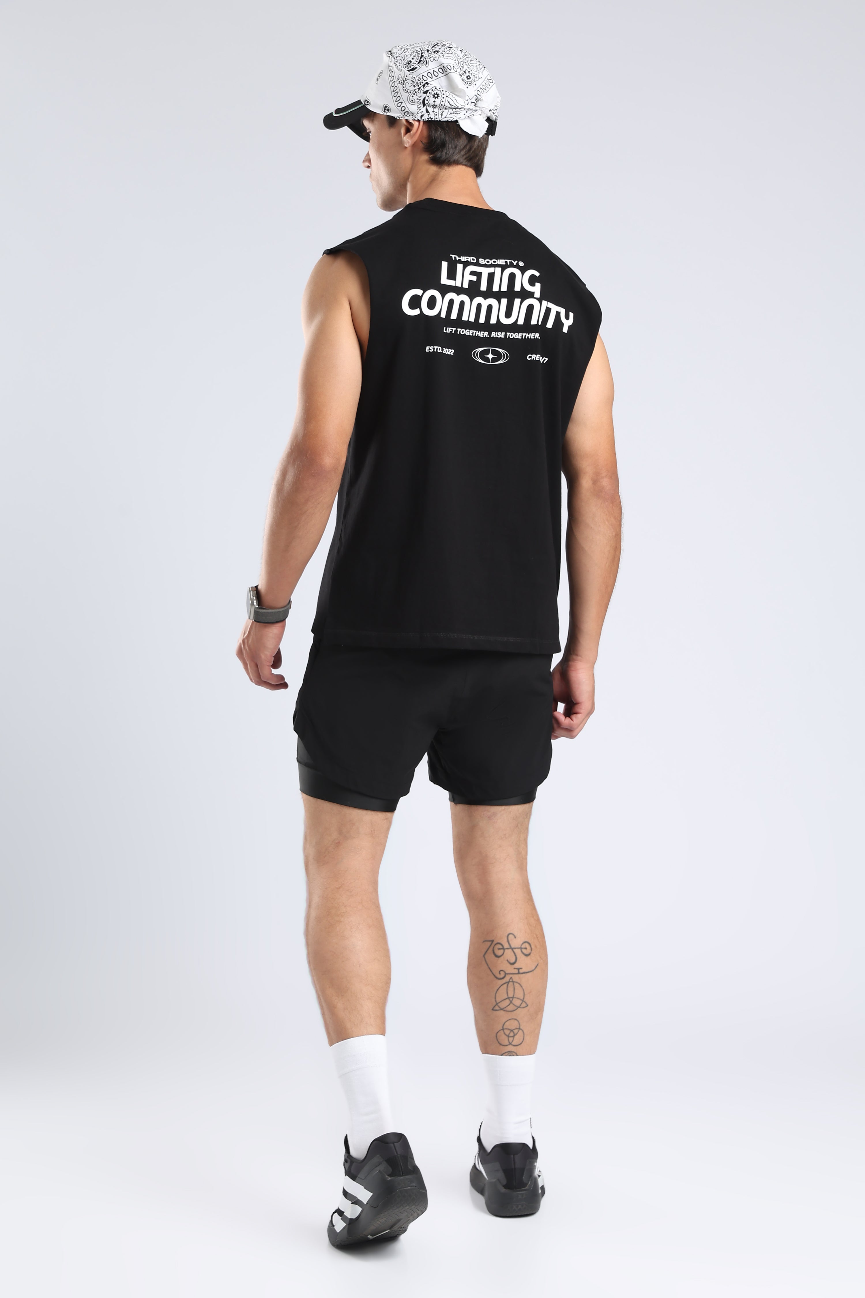 Back view of the black Lifting Community tank with bold white graphic