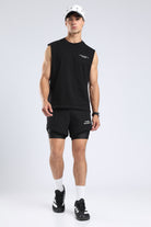Front view of the black Lifting Community tank with an oversized fit