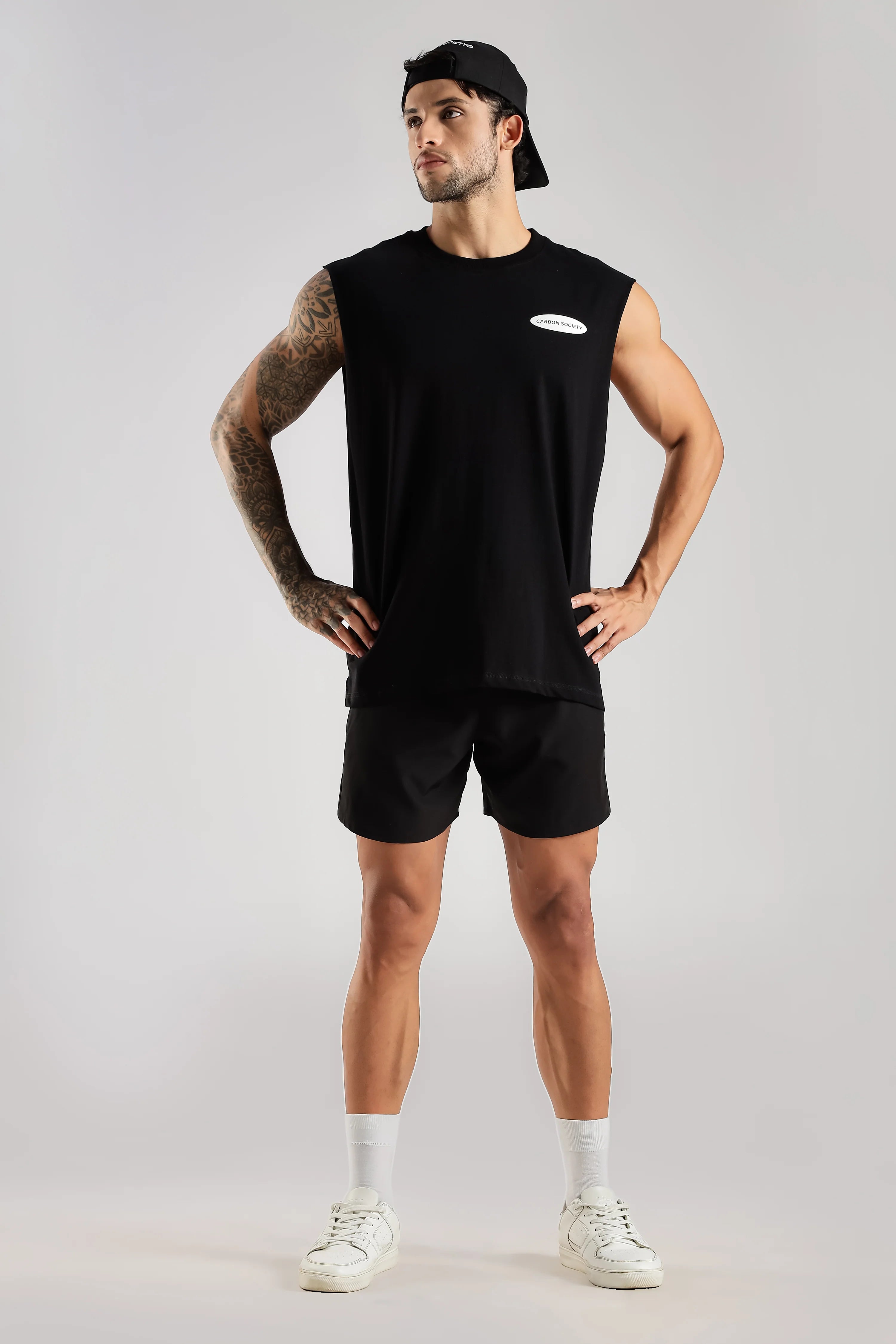 Black men's tank top with Carbon Society chest logo