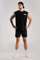 Black men's tank top with Carbon Society chest logo