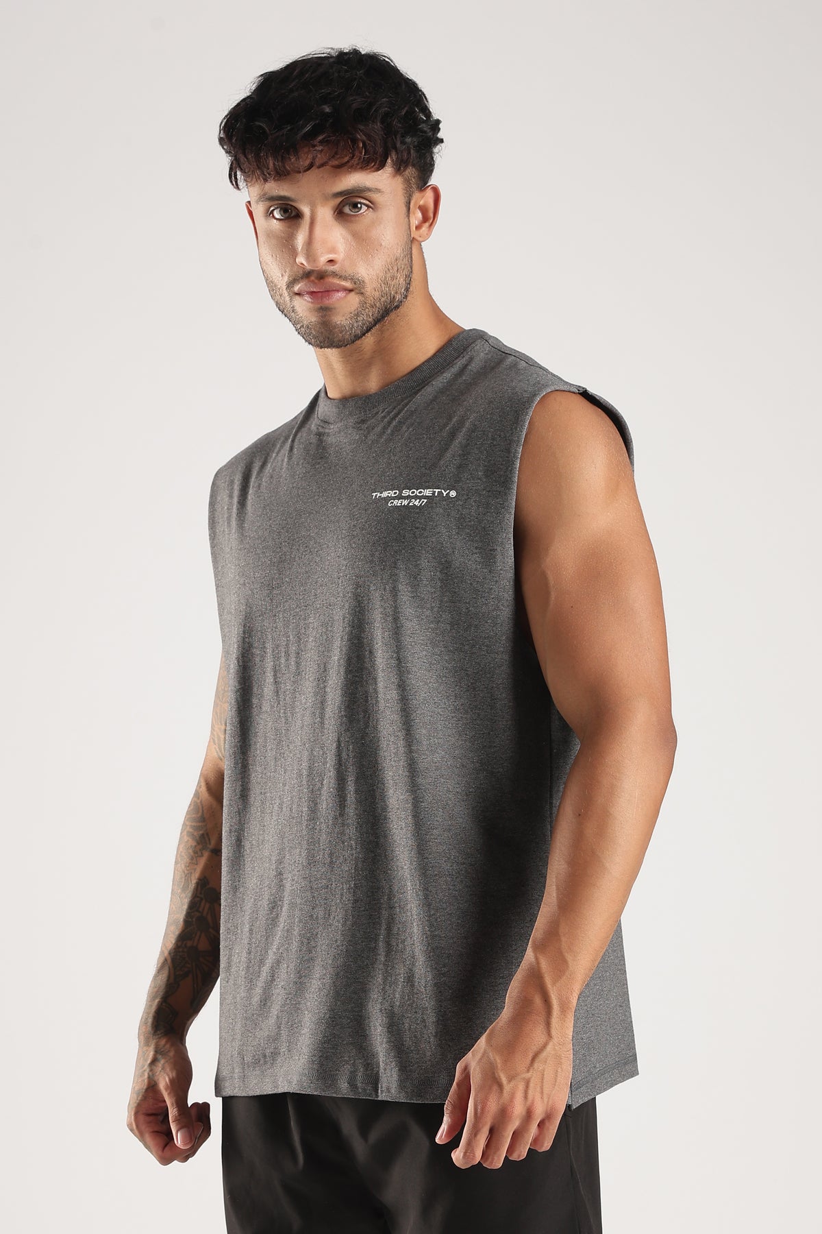 Angled front view of the Grey Marl tank with a small white chest logo