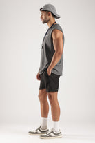 Side profile showing the sleeveless cut of the Grey Marl No Days Off Tank