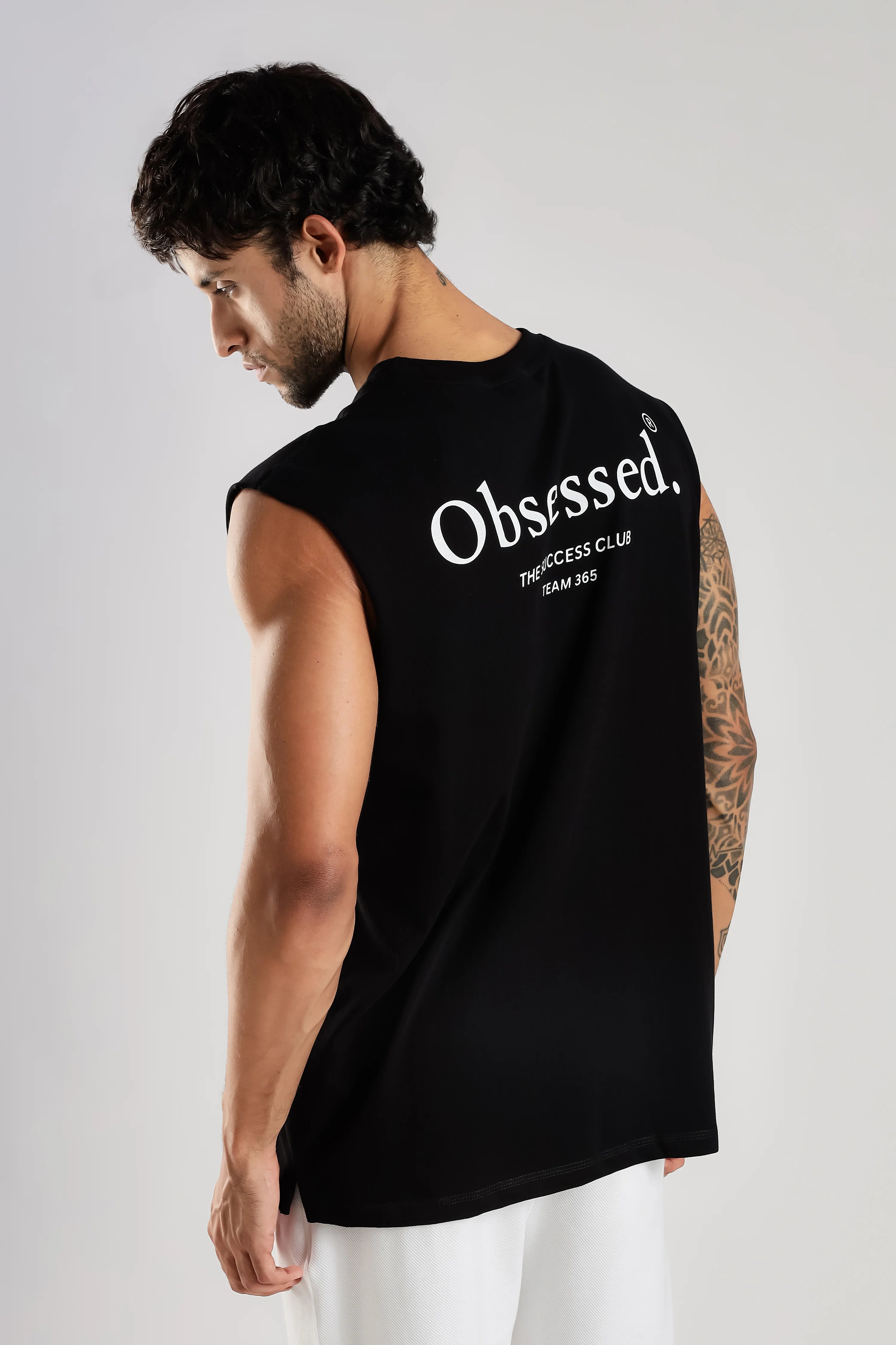 Black tank top with large Obsessed back graphic