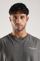 Close-up of the Grey Marl Obsessed Tank showing the Third Society Crew 24/7 chest logo