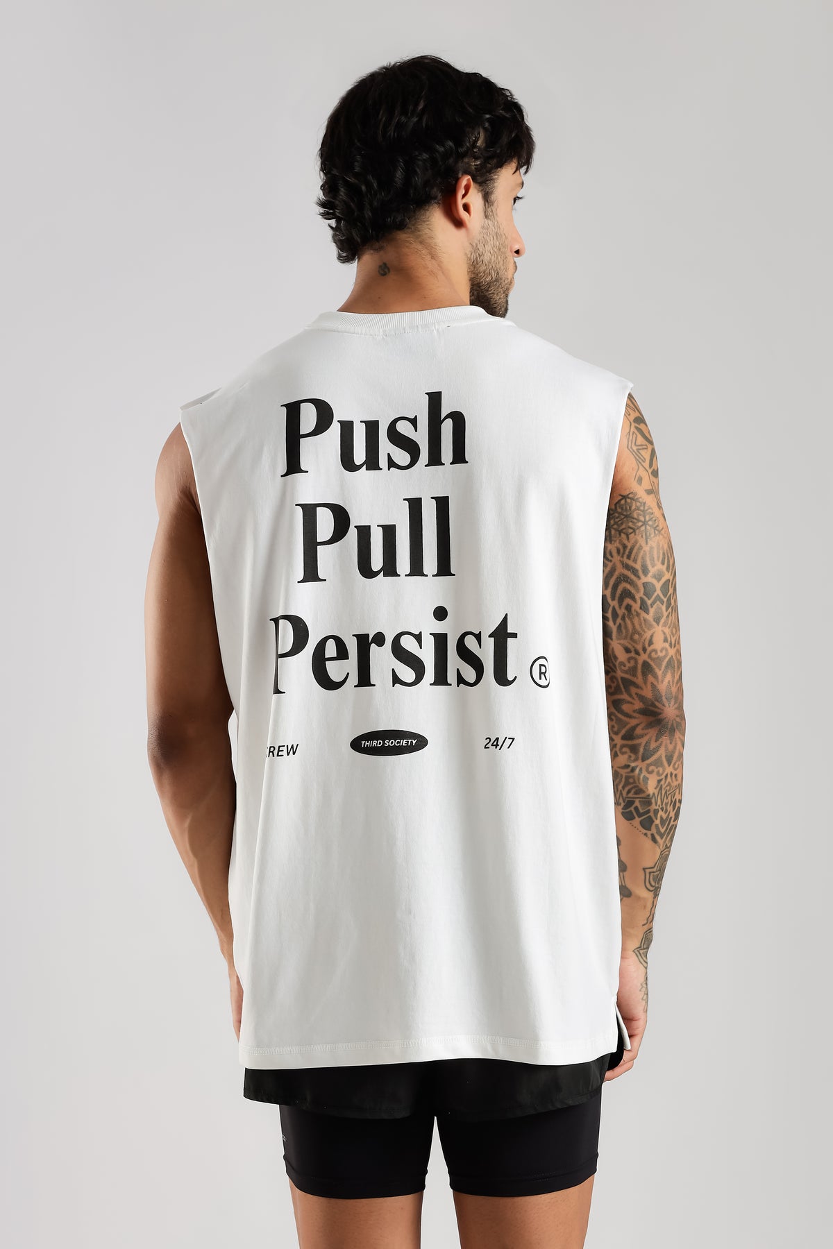 Back view of the white Push Pull Tank showing the large Persist graphic