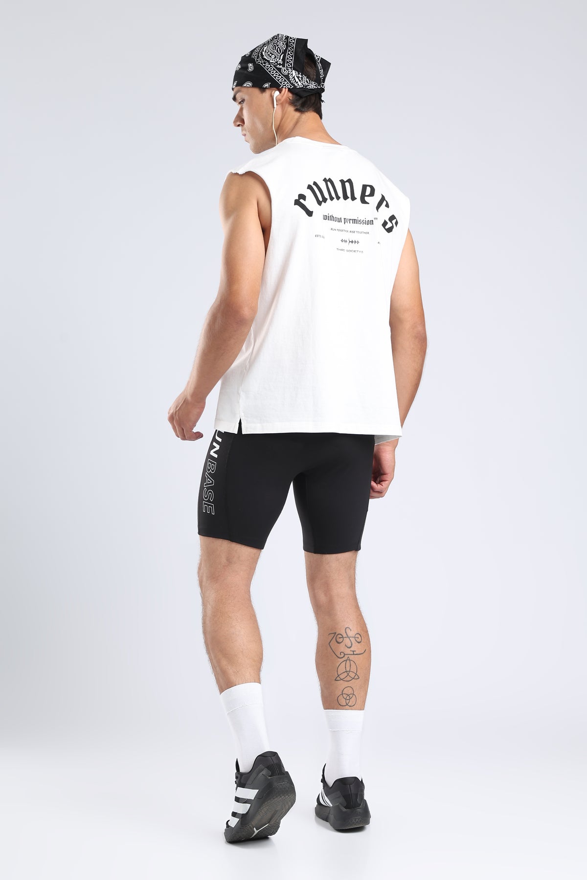 Back view of the white Runners Without Permission tank with its black graphic
