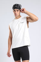 Model wearing the white Runners Without Permission tank with a black bandana