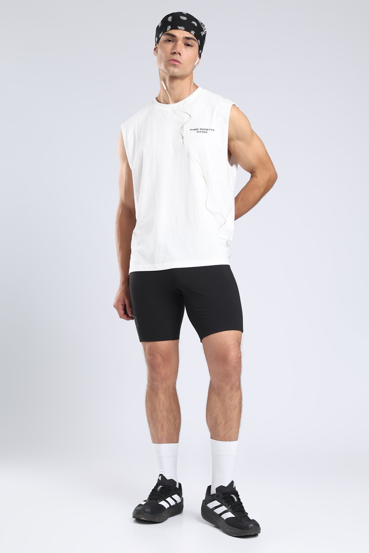 Front view of the white tank showing the small Third Society Run Base logo