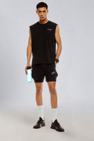 Model wearing the Carbon Wash tank top with black training shorts