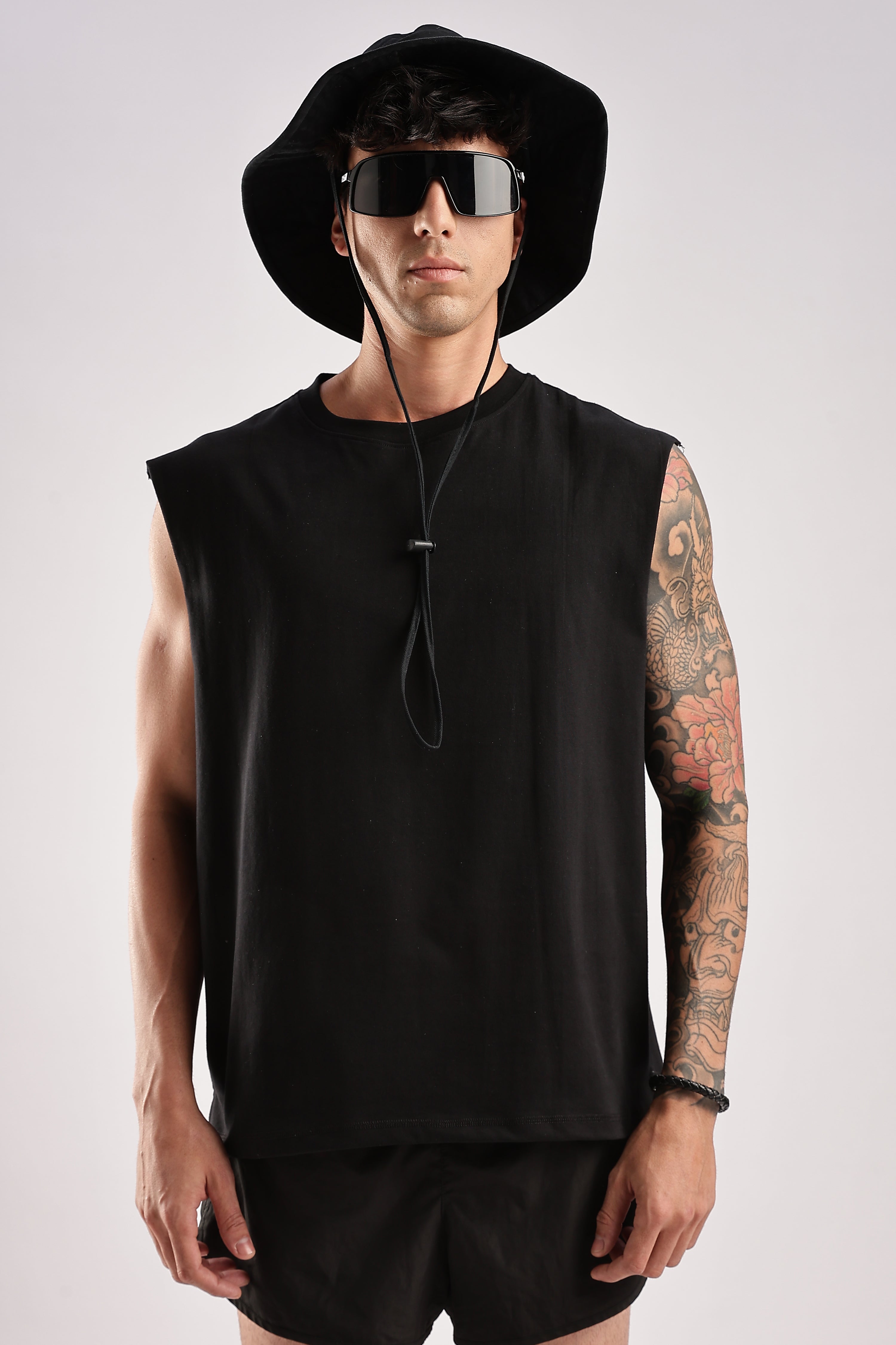 Black men's gym tank top, front view