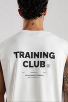 Close-up of the Training Club graphic on the back of the white tank top