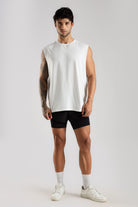 Model wearing the white Training Club tank top from the front