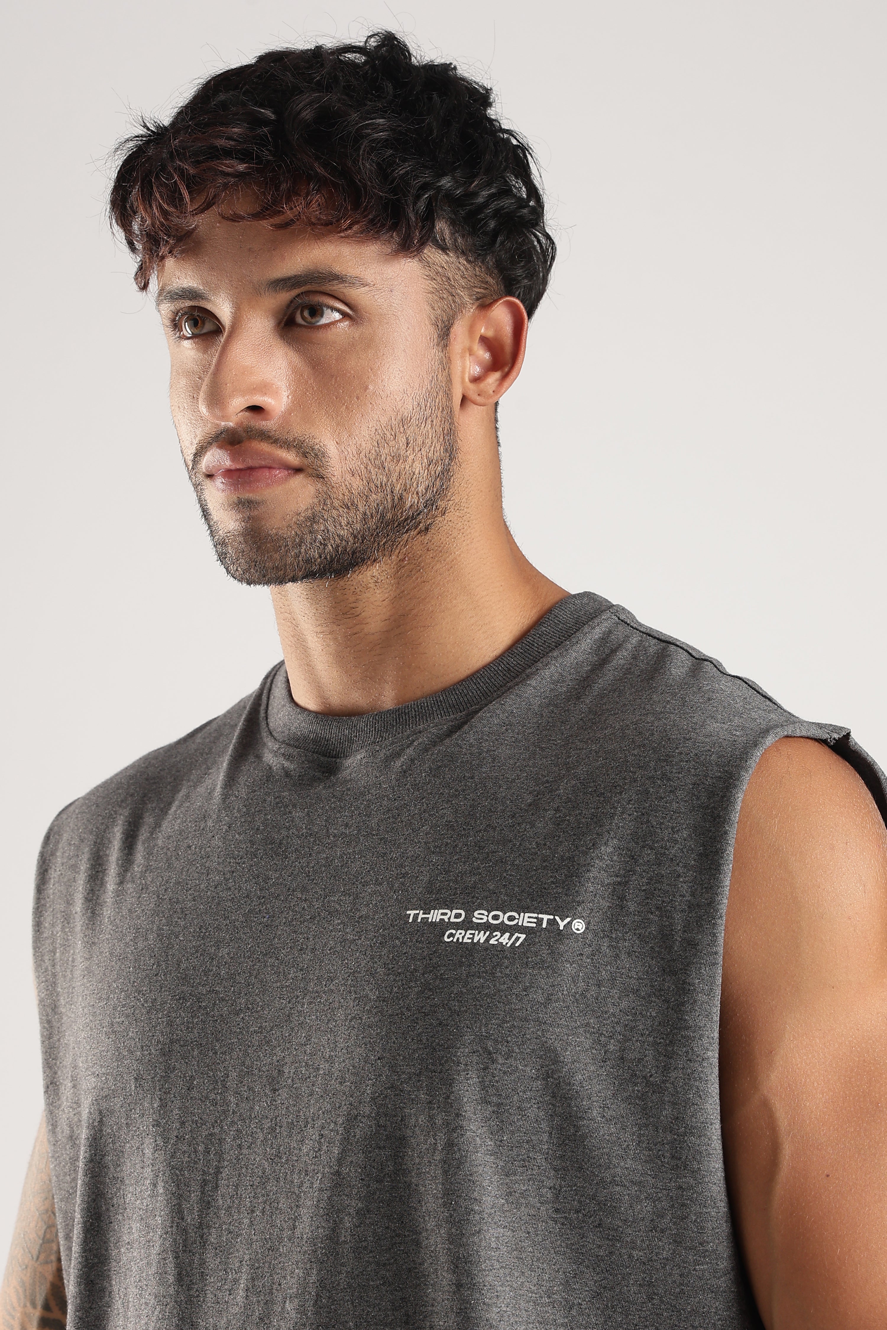 Close-up of the Grey Marl tank showing the Third Society Crew 24/7 chest logo